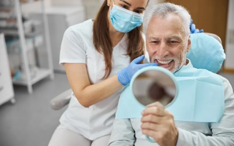 Octogenarian Shares Dental Implant Experiences Over a Quarter Century